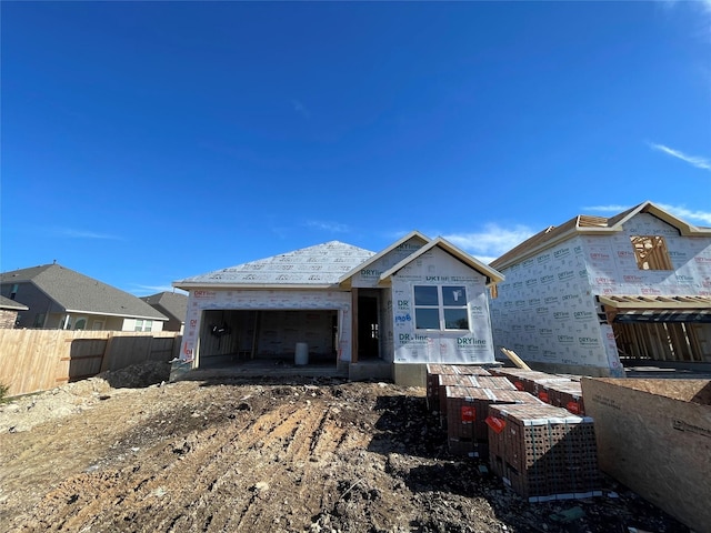 property under construction with a garage