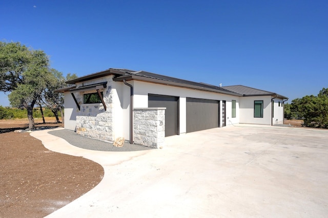 view of property exterior featuring a garage