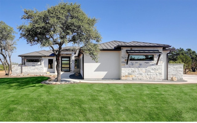 prairie-style house with a front lawn