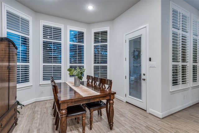 dining room with light hardwood / wood-style flooring