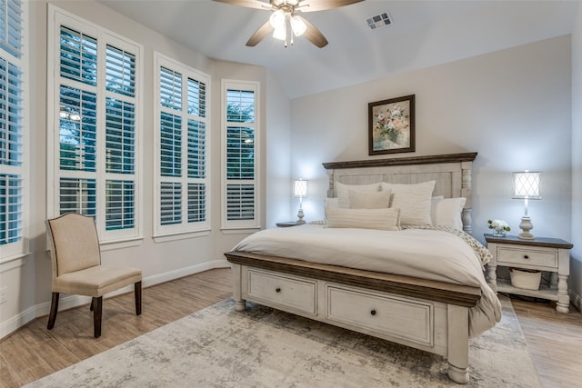 bedroom featuring light wood-type flooring and ceiling fan