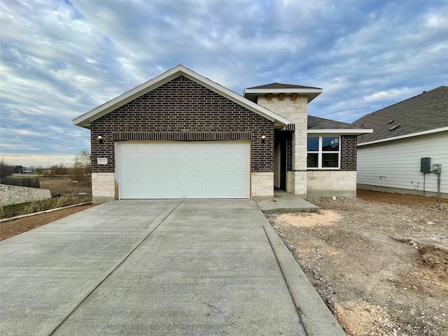 view of front of property featuring a garage