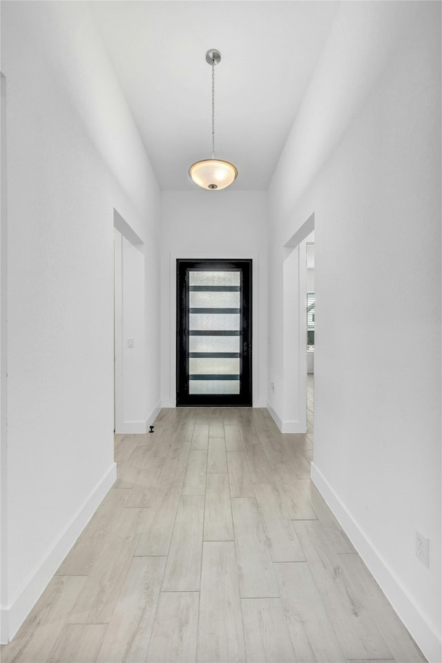 doorway featuring light hardwood / wood-style flooring