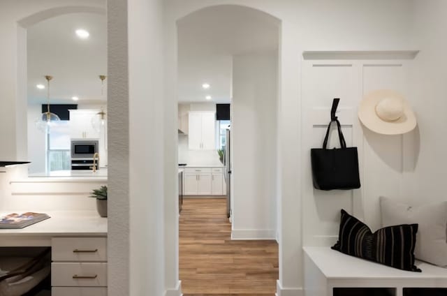 mudroom with light wood-type flooring