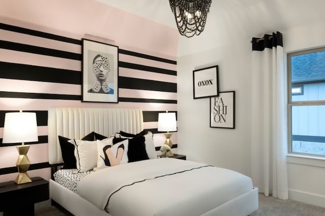 bedroom with radiator, carpet flooring, and a notable chandelier