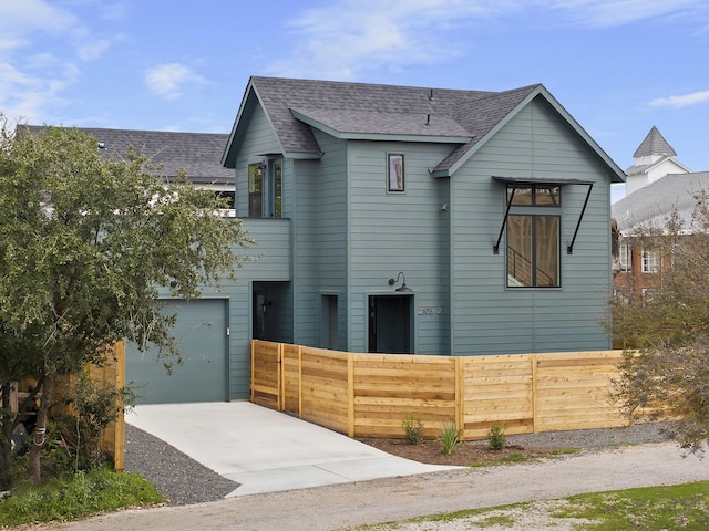 view of front of home with a garage