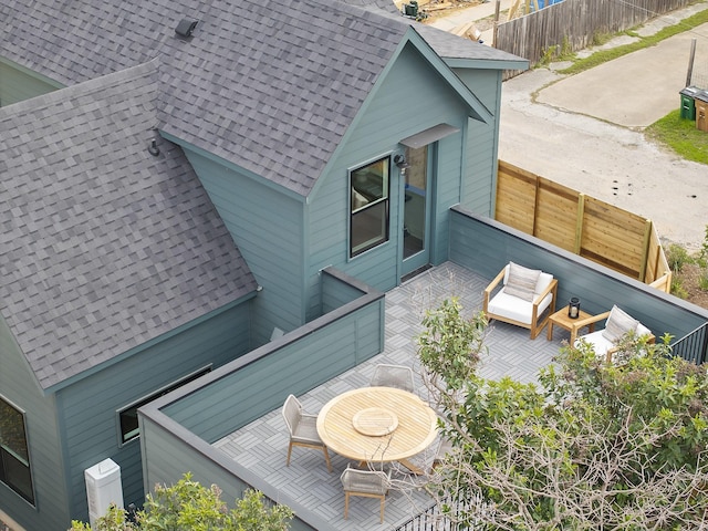 view of side of home featuring an outdoor hangout area