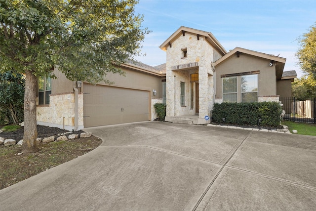 view of front of home with a garage