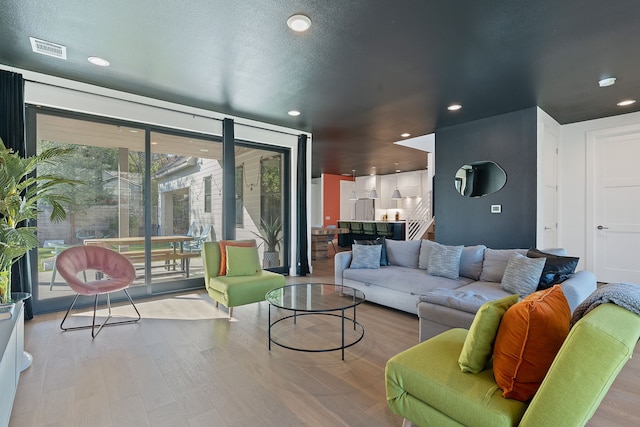 living room featuring light wood-type flooring