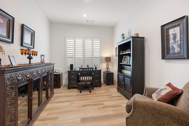 home office featuring light hardwood / wood-style floors