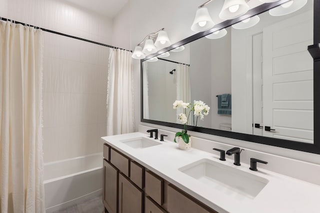 bathroom with vanity and shower / bath combo