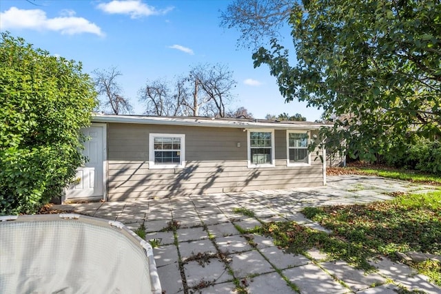 rear view of house featuring a patio area