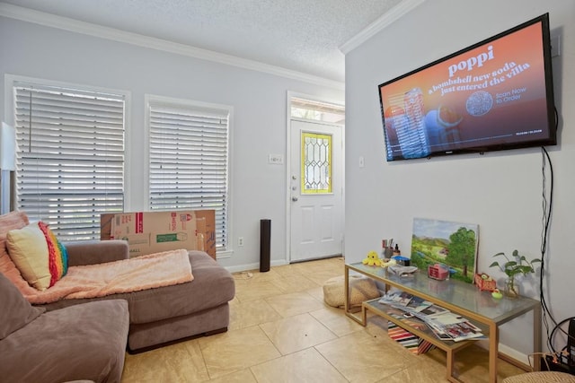 living room with light tile patterned floors, a textured ceiling, baseboards, and ornamental molding