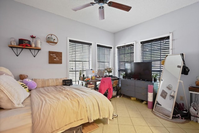 715 22 1/2 St Unit 101, Austin, TX 78705 - bedroom featuring a ceiling fan and light tile patterned flooring