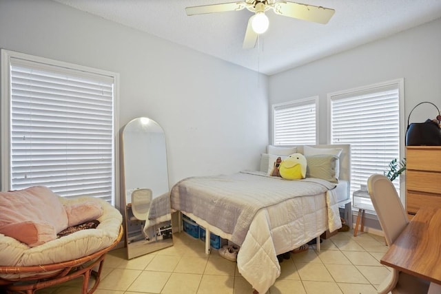 715 22 1/2 St Unit 101, Austin, TX 78705 - bedroom featuring light tile patterned floors and ceiling fan