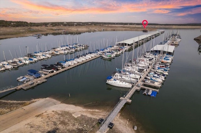 aerial view at dusk with a water view