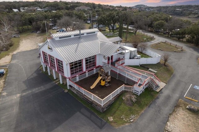 9 Sunset Park Cv, Lakeway, TX 78734 - view from above of property with a tree filled landscape
