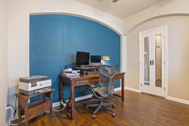 office space with ceiling fan and dark hardwood / wood-style flooring