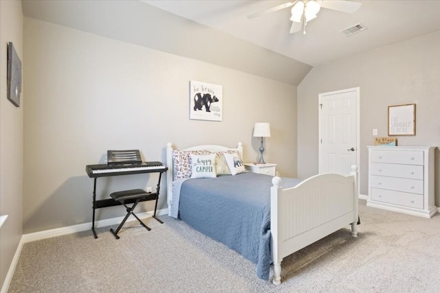 carpeted bedroom featuring lofted ceiling and ceiling fan