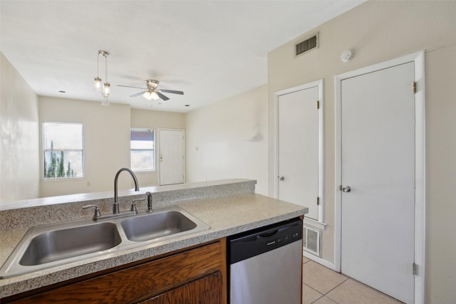 kitchen with ceiling fan, dishwasher, light tile patterned floors, and sink