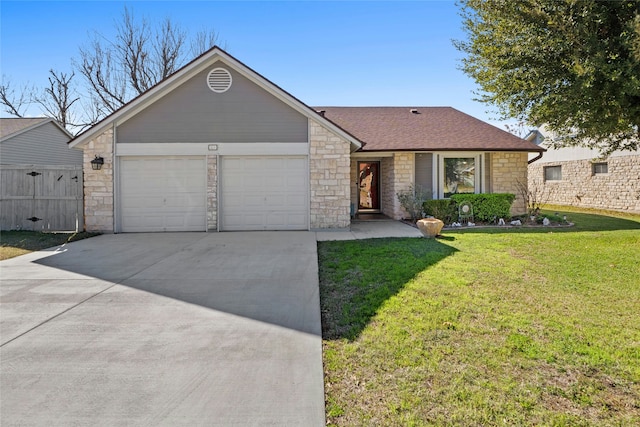 ranch-style home with a garage and a front lawn