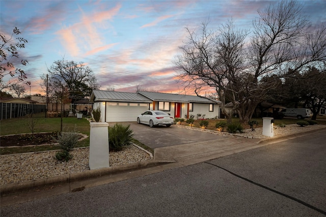 view of front of house with a garage