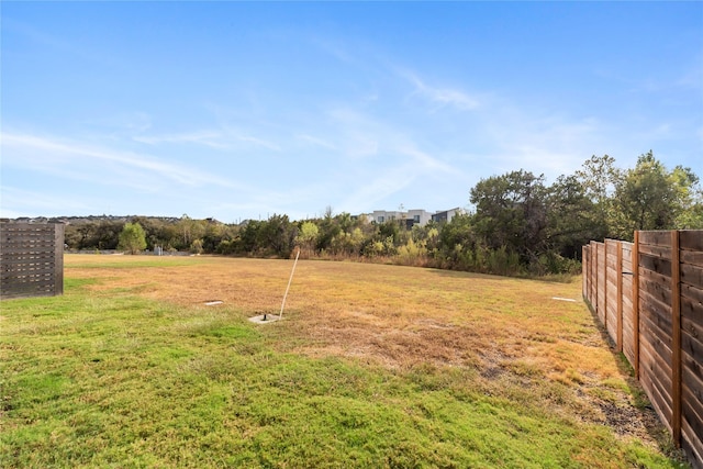 view of yard with a rural view