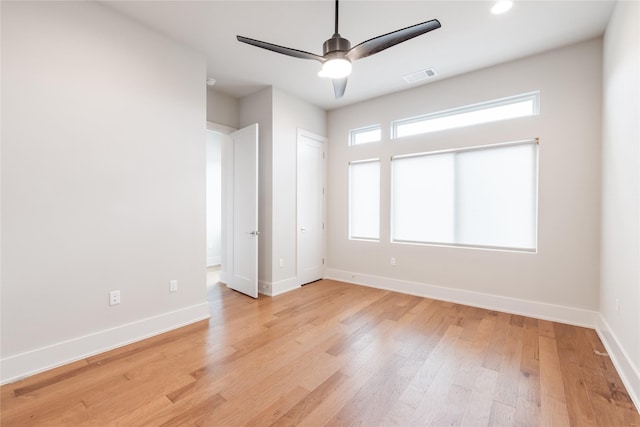 unfurnished bedroom featuring ceiling fan and light hardwood / wood-style flooring