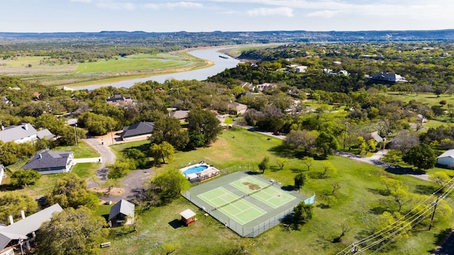 birds eye view of property featuring a water view