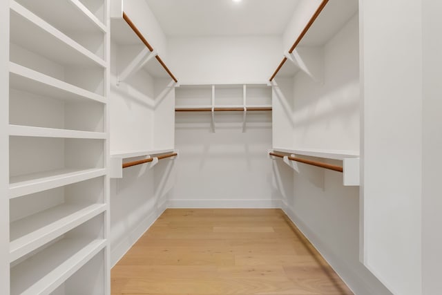 walk in closet featuring light wood-type flooring