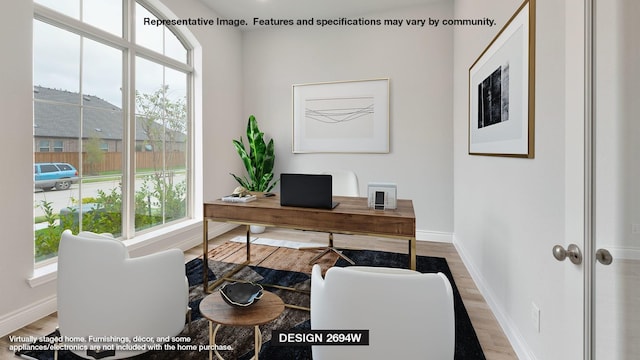 office space with hardwood / wood-style floors