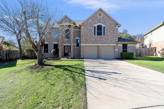 view of front of home featuring a front yard and a garage