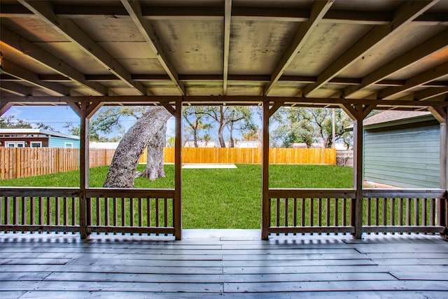 wooden deck with a yard