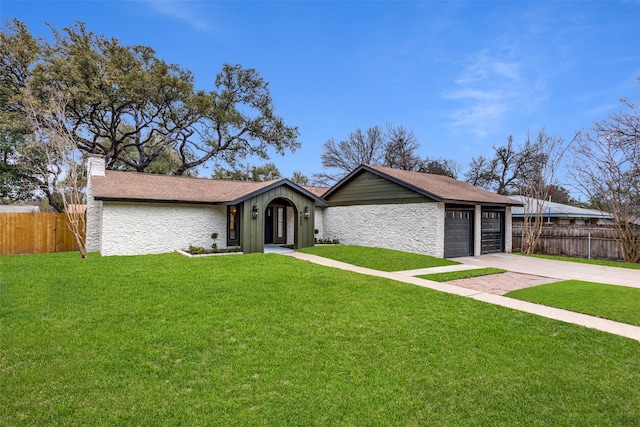 single story home with a garage and a front lawn