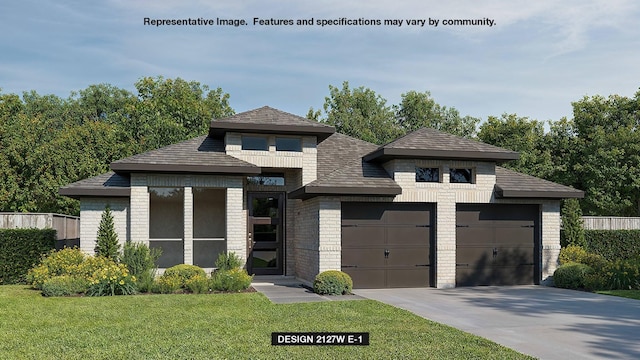 view of front facade with a front yard and a garage