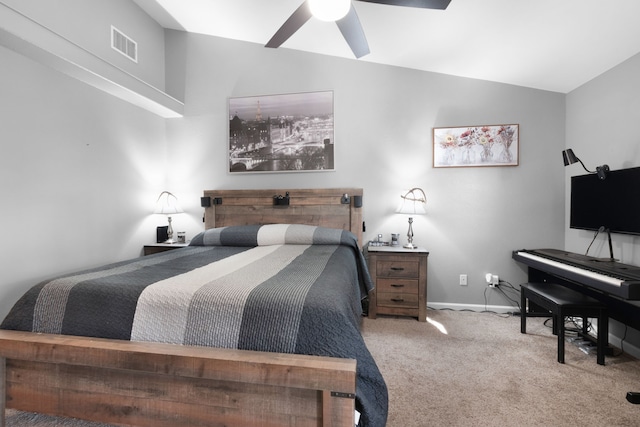 bedroom with ceiling fan, carpet, and vaulted ceiling