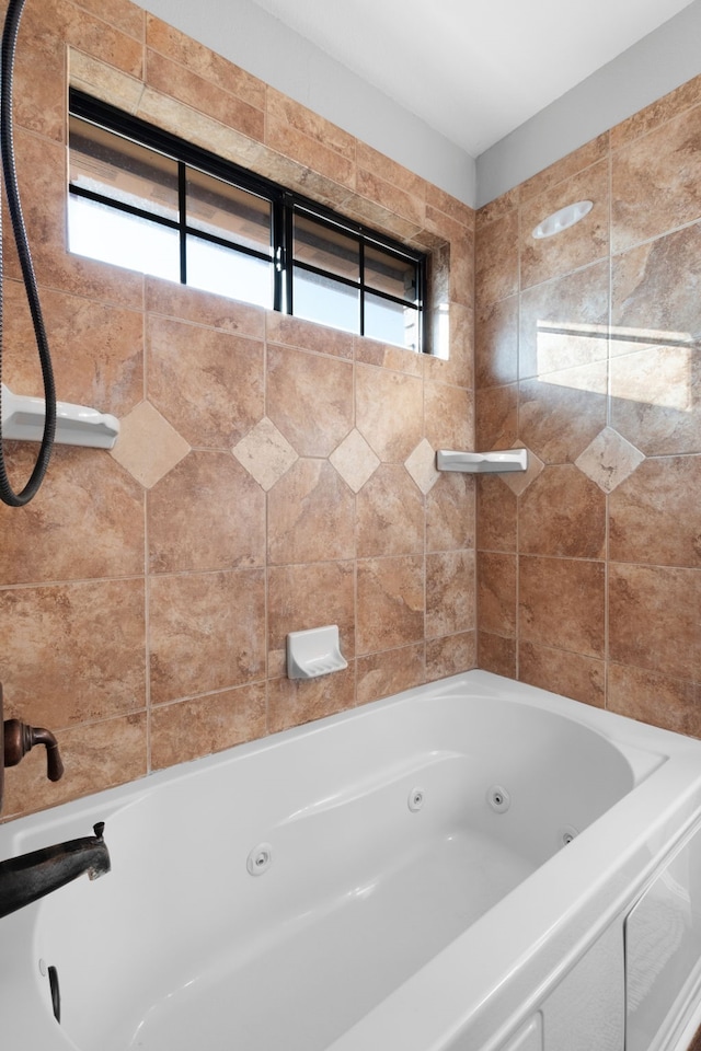 bathroom featuring a washtub