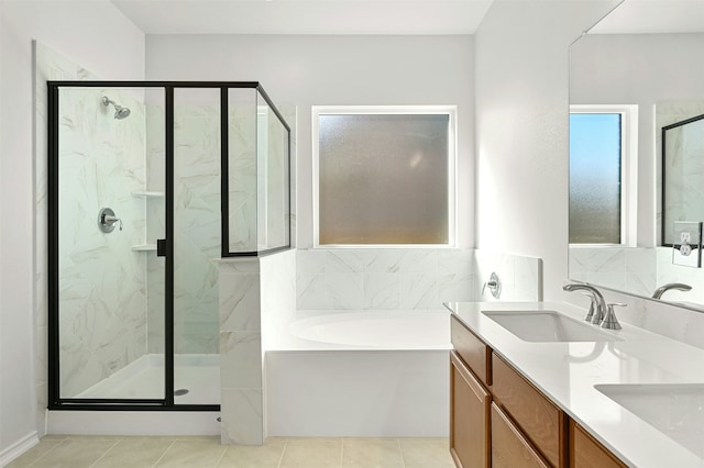 bathroom featuring separate shower and tub, tile patterned flooring, and vanity