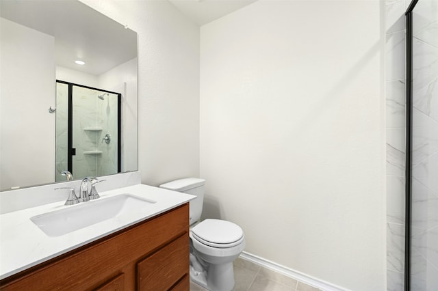 bathroom featuring toilet, an enclosed shower, tile patterned floors, and vanity