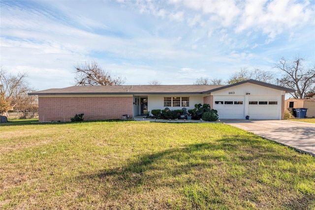 single story home featuring a front yard and a garage