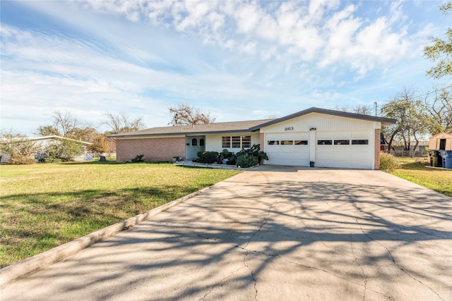 ranch-style home with a front yard and a garage