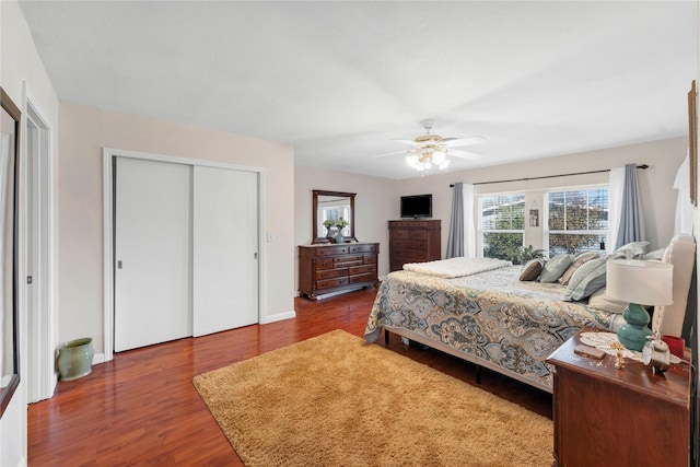 bedroom featuring ceiling fan and wood-type flooring