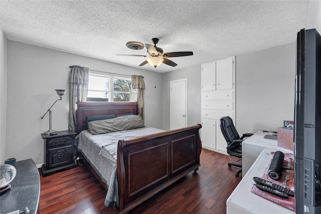 bedroom with a textured ceiling, a closet, ceiling fan, and dark wood-type flooring