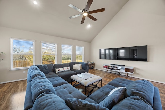 living room with high vaulted ceiling, dark hardwood / wood-style floors, and ceiling fan