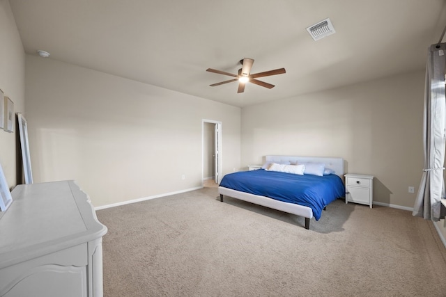 bedroom with ceiling fan and carpet flooring