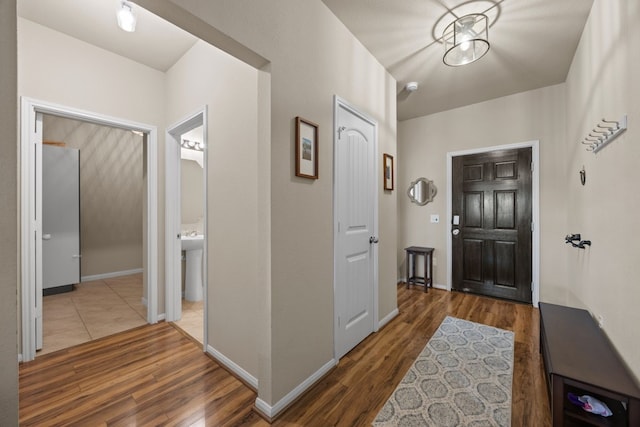 foyer with dark wood-type flooring