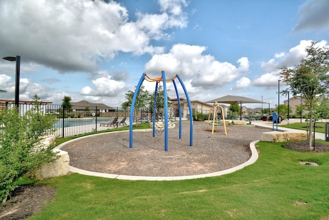 view of play area featuring a yard