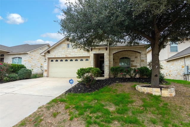 ranch-style house featuring a garage