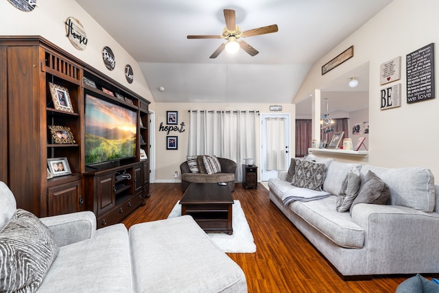 living room with ceiling fan, dark wood-type flooring, and vaulted ceiling