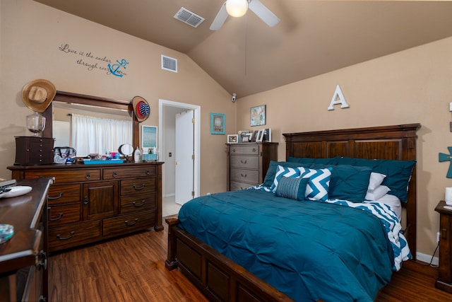 bedroom featuring dark hardwood / wood-style floors, ceiling fan, and lofted ceiling